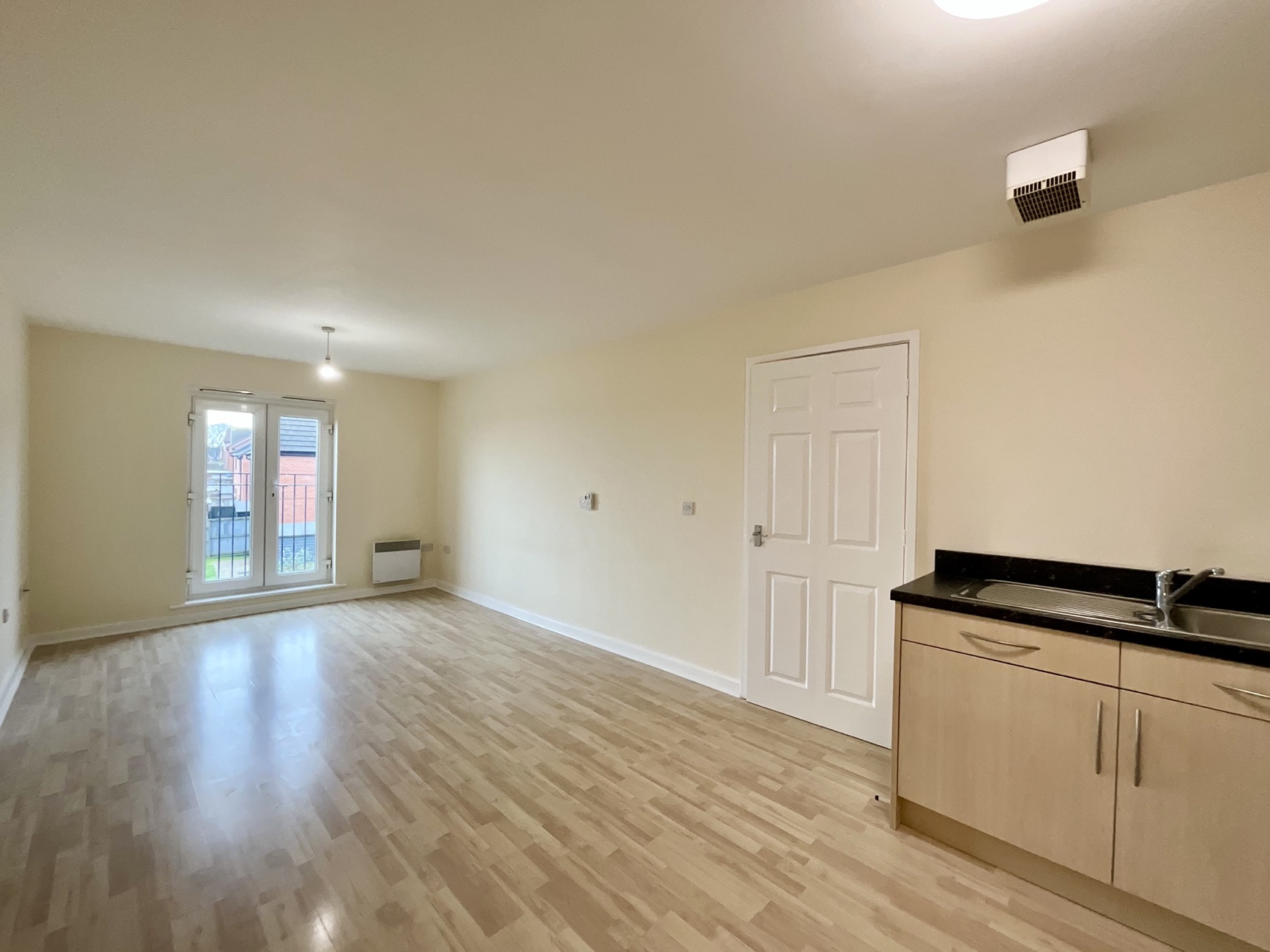 open plan lounge/kitchen